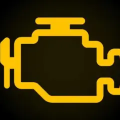 Testigo de avería motor en amarillo. Símbolo de motor encendido en el coche, indica un problema.