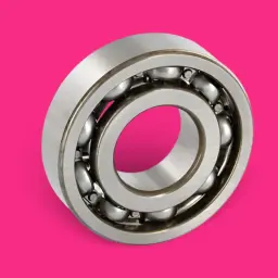 Un cojinete de rueda, esencial para el movimiento suave, con esferas metálicas dentro de anillos.