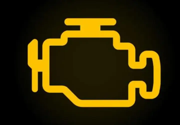 Testigo de avería motor en amarillo. Símbolo de motor encendido en el coche, indica un problema.