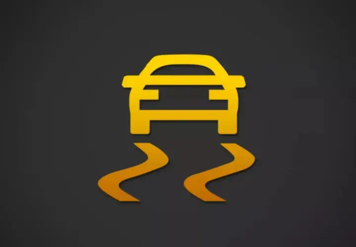Icono de coche amarillo con líneas curvas debajo, indicando un fallo sistema esc.