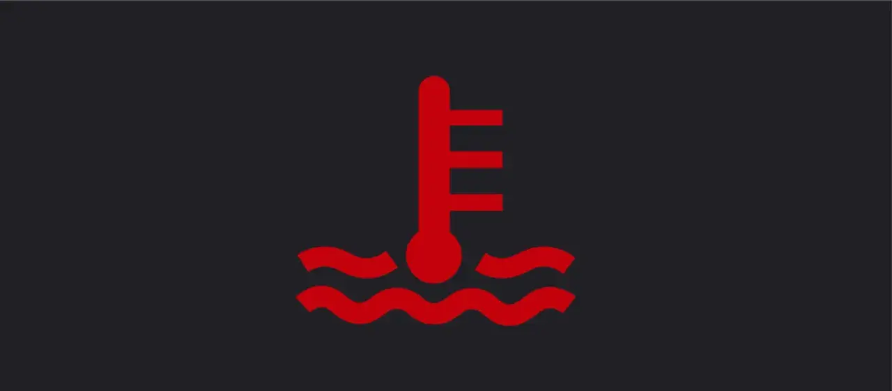 Icono de termómetro rojo sobre olas, indicando nivel refrigerante bajo.